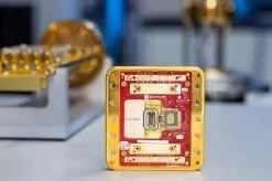 A gold square with a red and white circuit boardAI-generated content may be incorrect.